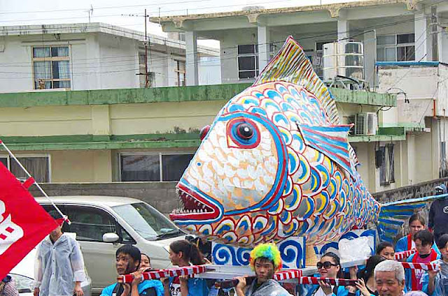 portable shrine, fish, costumes, parade