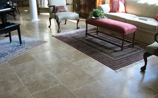 Classic stone tile gives this room an elegant look