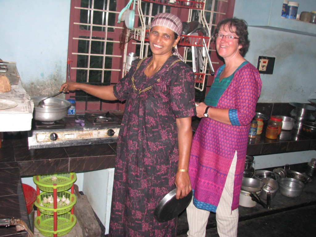Guests learning cooking at Bamboo Village home stay, Wayanad, Kerala