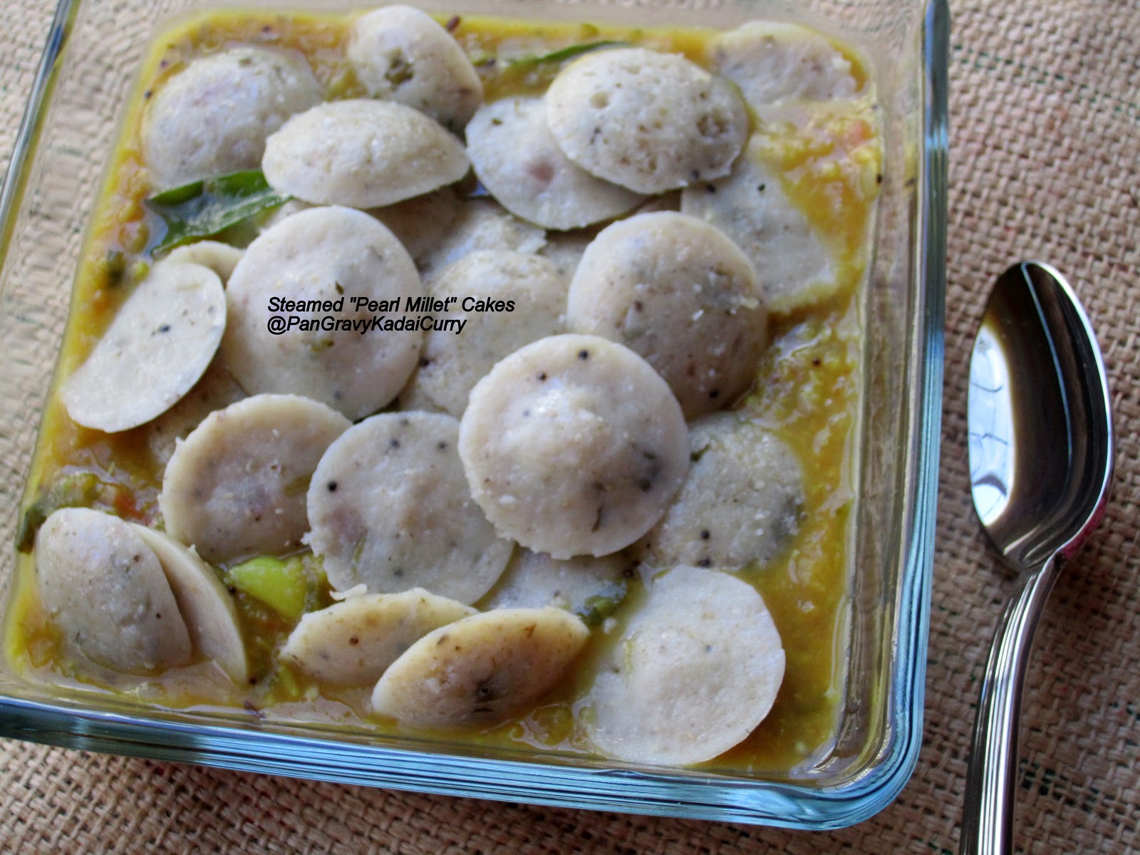 Pan Gravy Kadai Curry Steamed PearlMillet Cakes "Bajra/Kambu Idli" With Smashed Eggplant and