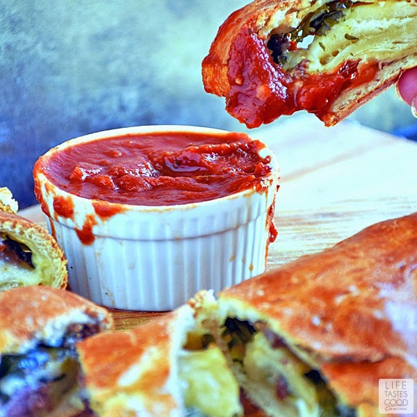 Meatball Pizza Bread | by Life Tastes Good is a tasty kid-friendly recipe that is easy to make any night of the week! Pair it with a salad for a fun dinner or serve it as a party appetizer! Either way, this is sure to be a big hit with everyone!