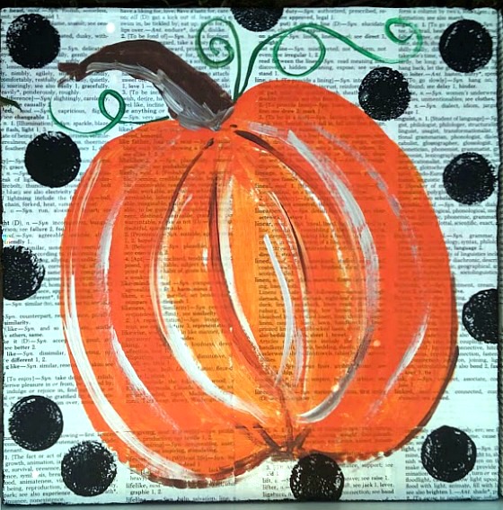 Paint a pumpkin over old artwork at www.diybeautify.com