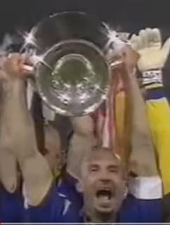 Gianluca Vialli holds aloft the European Cup after the 1996 final in Rome