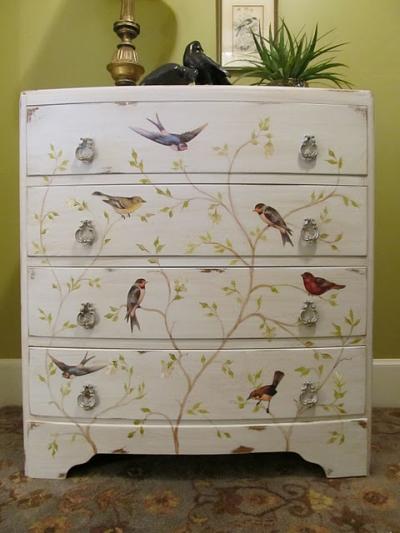 painted chest of drawers with painted and decoupaged bird and tree motif