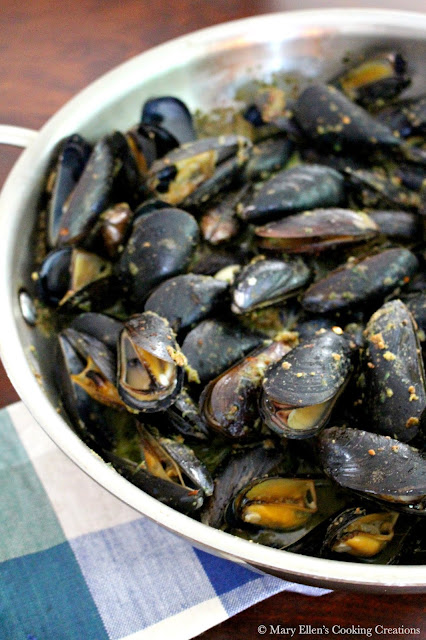 Mussels roasted in an almond butter with garlic, lemon and wine. Easy yet impressive appetizer or meal. Perfect with wine and crusty bread. Recipe via Fore Street, Portland, Maine.