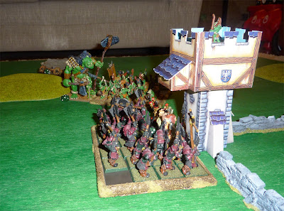 A Warhammer Fantasy Battle Report between Warriors of Chaos and Savage Orcs.