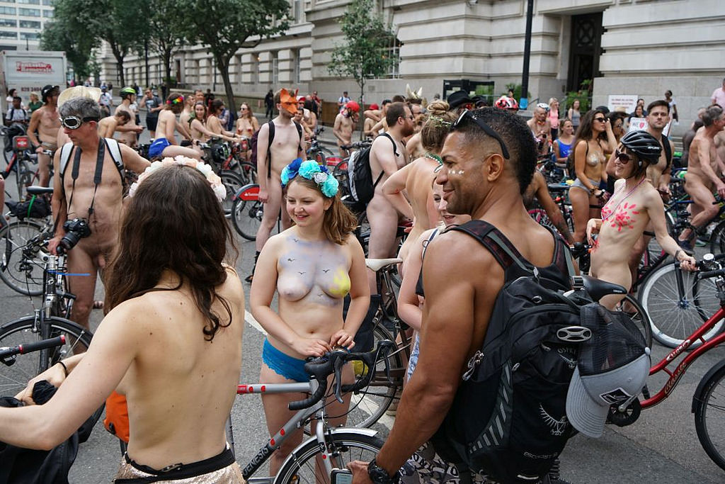 Real Life Half Naked Female and Naked Male at World naked Bike Ride. 