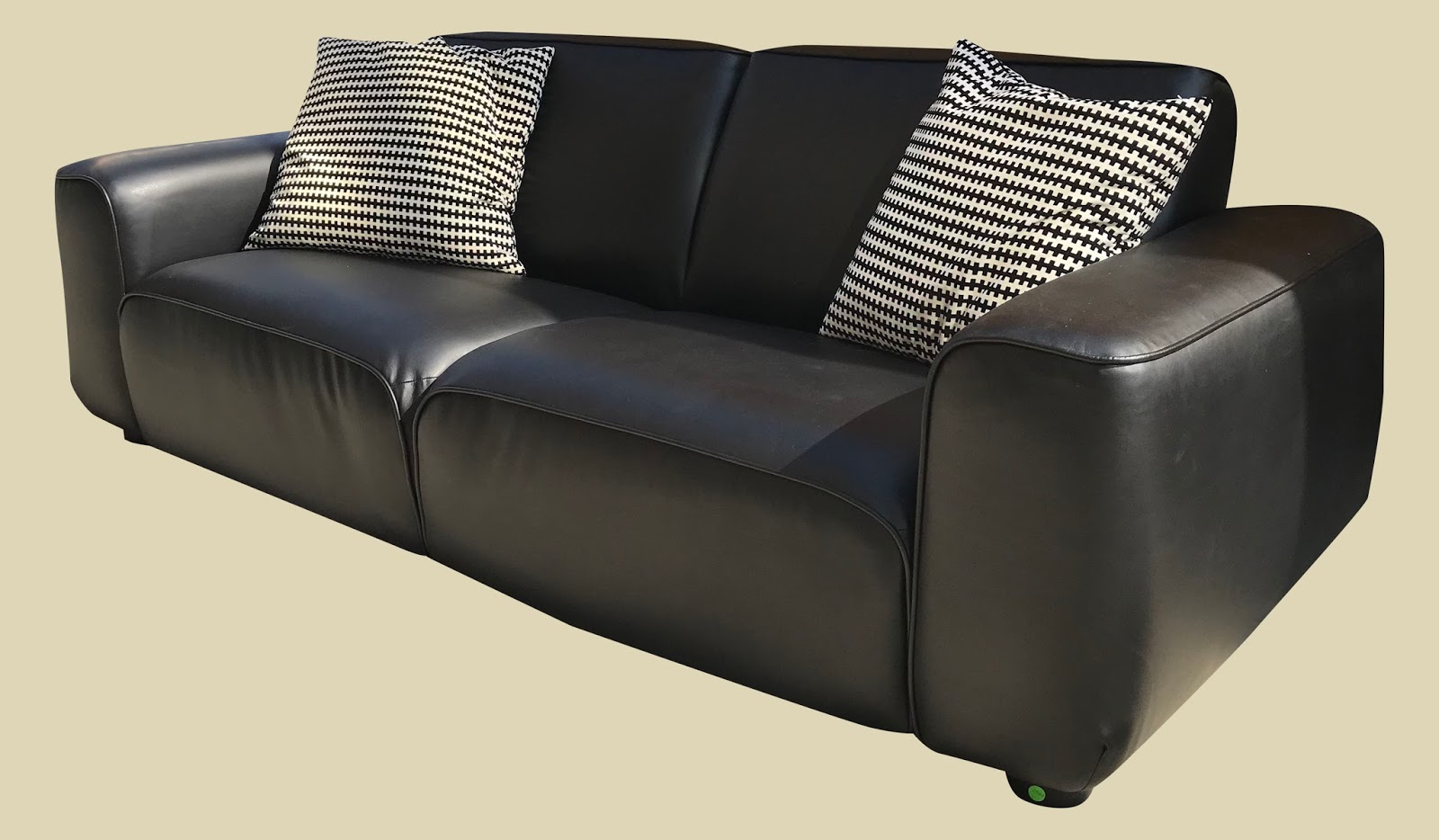 Uhuru Furniture & Collectibles Faux Leather Sofa can be taken apart
