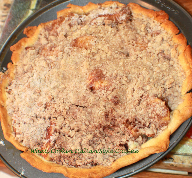 this is an apple pie with a dutch apple streusel topping