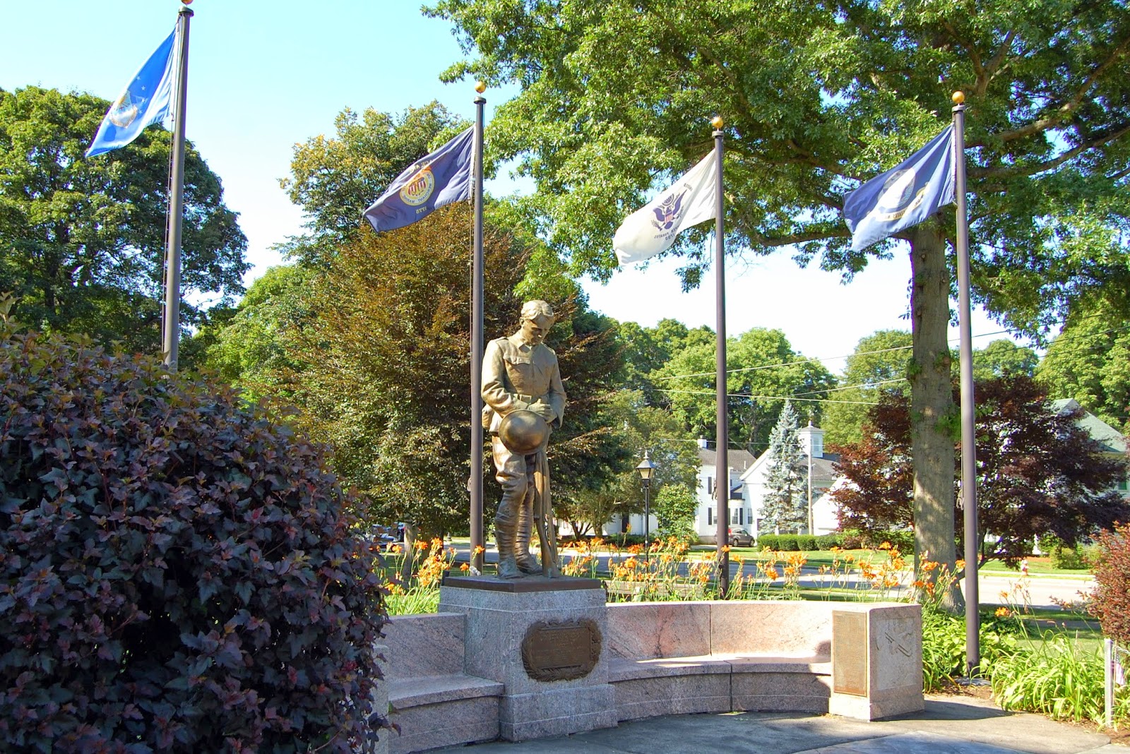 flags flying in the breeze over the World War I memorial
