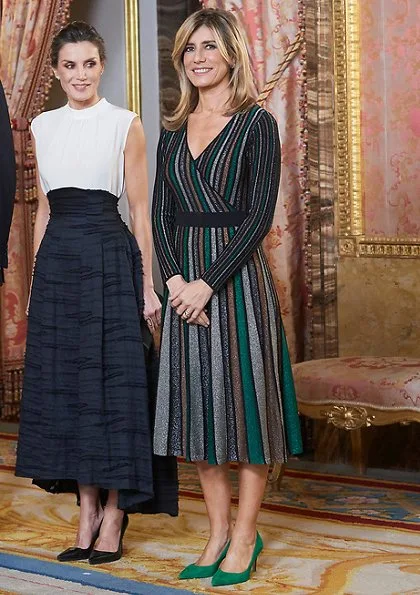 Queen Letizia wore HM Conscious silk-linen blend long skirt. Begona Gomez wore Pedro del Hierro Lurex jersey knit dress