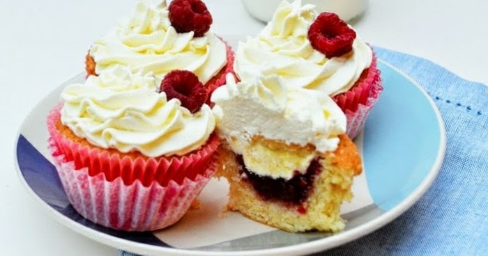 Vanilla Cupcakes with Clotted Cream and Raspberry Jam
