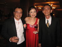 The wedding couple with band manager Jason Geh