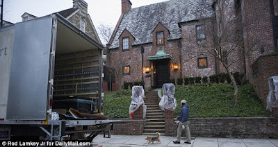 1e Moving vans seen arriving at $4.3m DC mansion where the Obama family will live