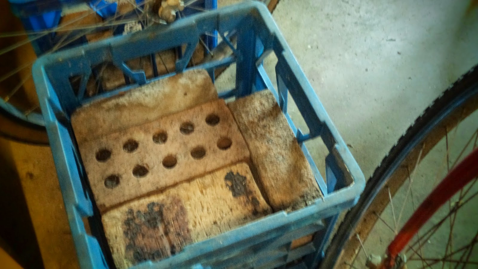 Make your own free bike racks out of milk crates and bricks!