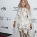 LIL' KIM WORE LACY JUMPSUIT AND GOLD THIGH-HIGH BOOTS FOR PREMIERE AT TRIBECA.(SEE PHOTOS)
