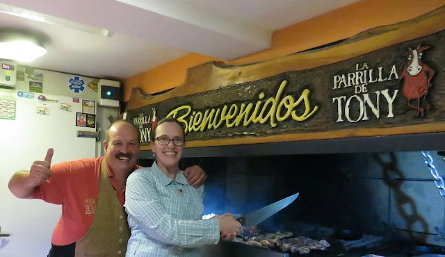 Tony poses by the grill at La Parrilla de Tony in Bariloche Argentina