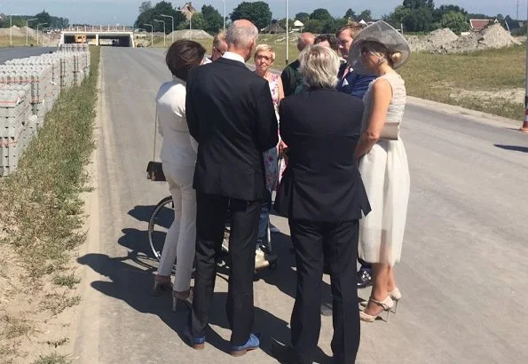 King Willem-Alexander of The Netherlands and Queen Máxima of The Netherlands visited West Friesland region. Natan dress