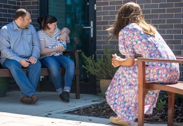 Kate Middleton wore a new pastel floral pattern dress by Faithfull the Brand, Russell and Bromley wedges, Accessorize hoop earrings