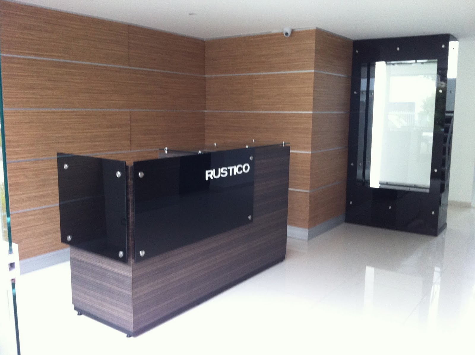Artefacto Studios Mueble recepción edificio Rustico