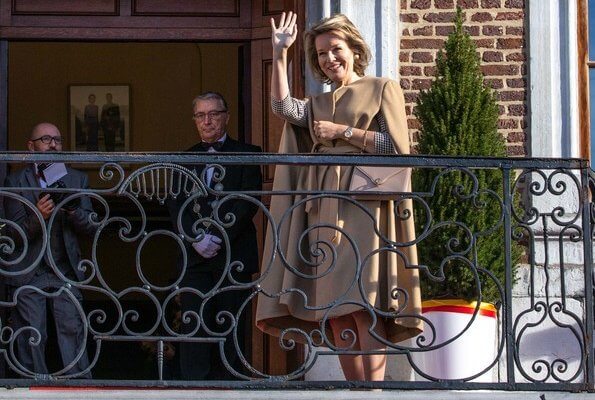 Queen Mathilde visited J and JOY in Waremme which is a clothing brand that is also socially and philanthropically active. Natan dress and camel cape