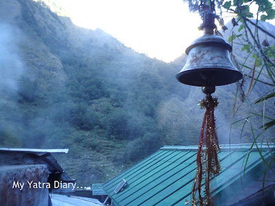 A temple bell hangs in Gangnani, Enroute to Gangotri