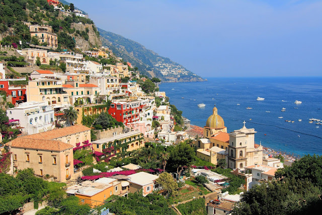 The allure of Positano, Italy, and the Mediterranean Sea beckons in the Summertime! Photo: WikiMedia.org.