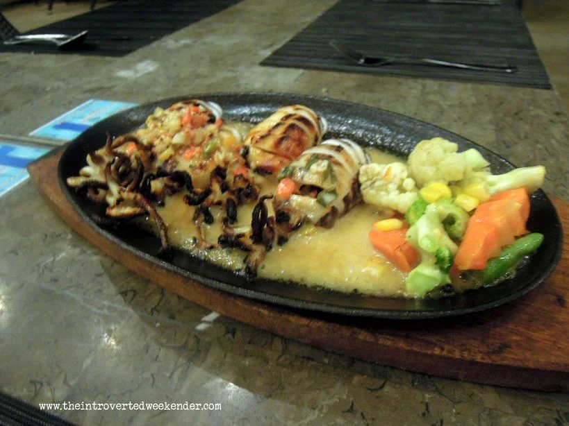 Sizzling squid at Azure Restaurant of Ocean Suites Boutique Hotel Bohol