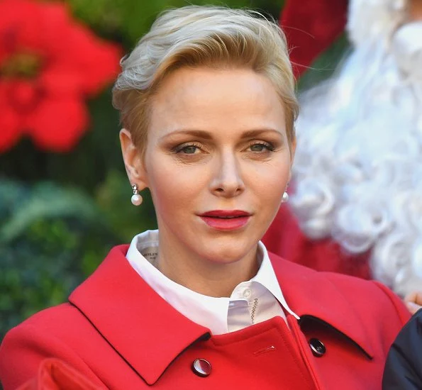 Prince Albert, Princess Charlene, Prince Jacques and Princess Gabriella attended the Children's Christmas ceremony and the Christmas gifts distribution at the Monaco Palace.