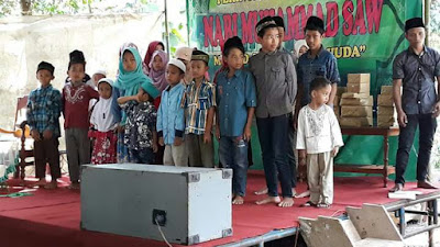 22 ANAK YATIM DESA KALIGINTUNG, MENDAPAT SANTUNAN.
