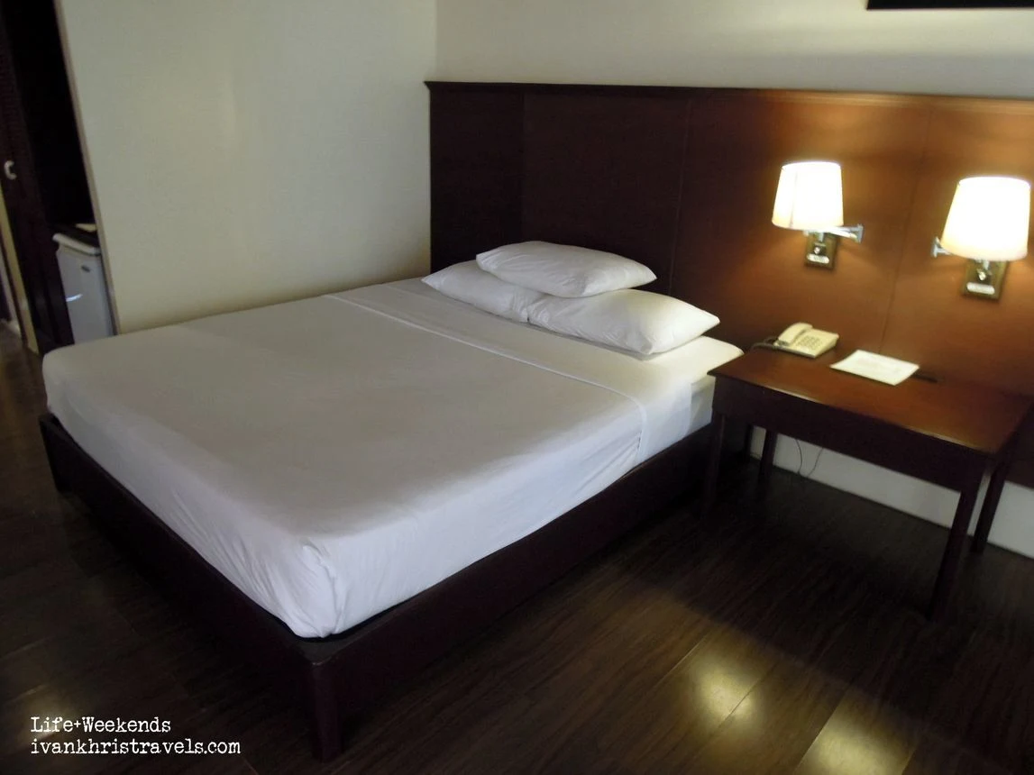 Bed at Dos Palmas Island Resort and Spa
