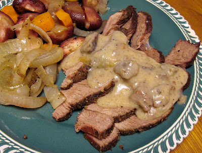Grilled beef roast with vegetables and gravy