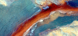 Allegory, The Apocalypse, fiery red cloud sailing the turquoise sky destroying everything in its path, abstract landscapes of deserts of Africa from the air, Munimara Collection of Abstract Naturalism Allegory, The Apocalypse, fiery red cloud sailing the turquoise sky destroying everything in its path, abstract landscapes of deserts of Africa from the air,