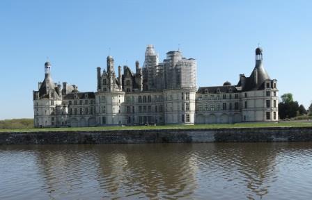 Looking over the lake to Chateau de Chambord in the Loire Valley 