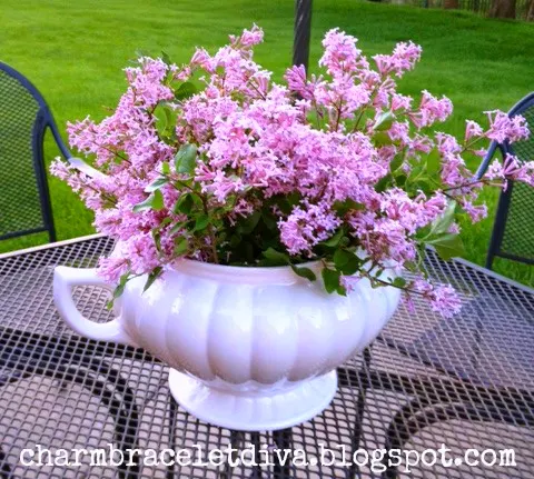 lilacs in ironstone tureen on patio table