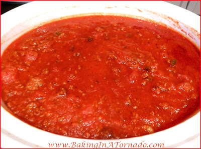 Hearty Meat Sauce for a hot and filling spaghetti dinner. Developed to have a bit of a kick to it, but the heat can easily be toned down. This chunky meat sauce can be made stove-top or in a slow cooker. | Recipe developed by www.BakingInATornado.com | #recipe #dinner