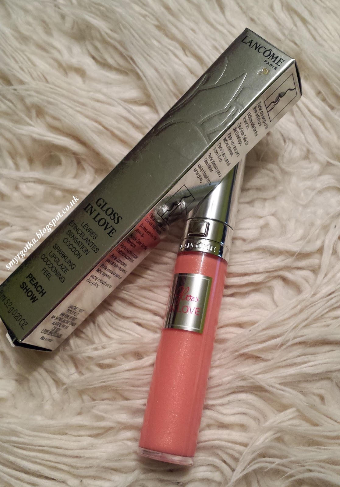 Confession of a beautyholic... Gloss in love... 146 peach show