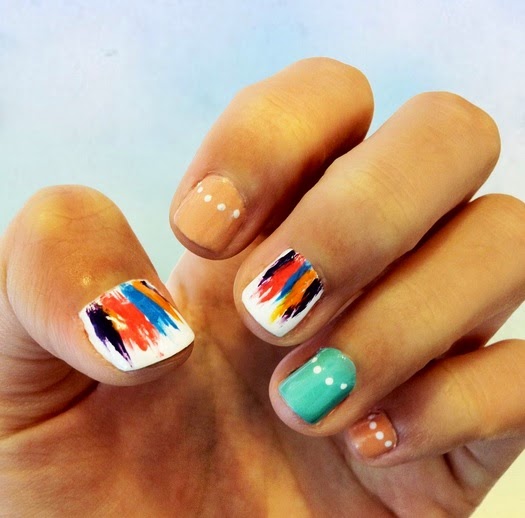 Whimsical colourful nails with bright feather accents