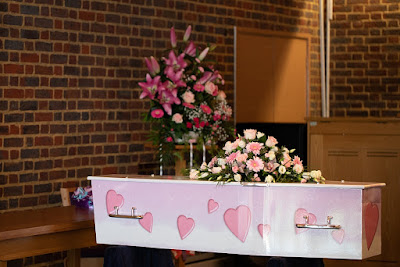 Jessica's casket at the front of the church