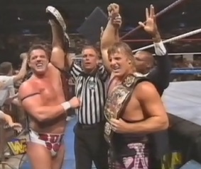 WWF / WWE IN YOUR HOUSE 10: Mind Games - Owen Hart & British Bulldog beat The Smoking Gunns for the WWF Tag Team Titles