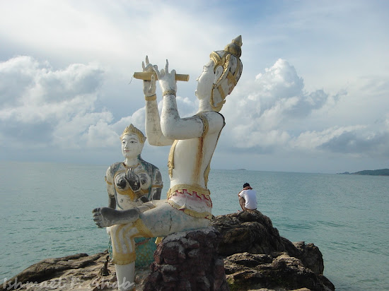 Praying on the rocks of Koh Samet Island