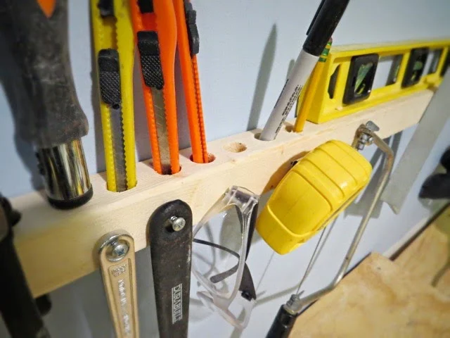 closer view of tools stored in 2x2 wall storage