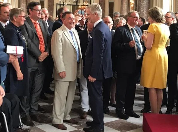 Queen Mathilde and King Philippe of Belgium hosted a reception at the Royal castle. Queen wore Natan dress