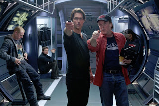 Director Brad Bird with Tom Cruise on the set of "Mission Impossible - Ghost Protocol" Director Brad Bird Tom Cruise on the set of Mission Impossible - Ghost Protocol