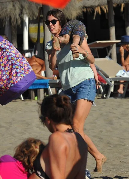 Charlotte Casiraghi and son, Raphaël Casiraghi Elmaleh on the beach in Tuscany, holiday style