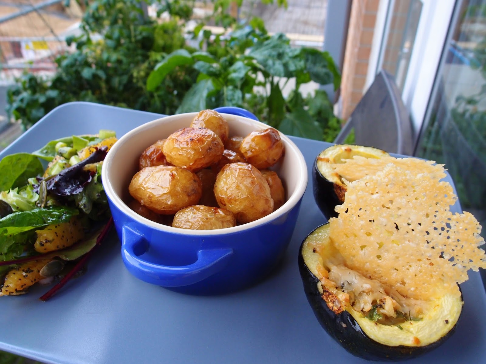 The VegHog Stuffed gem squashes with baked new potatoes