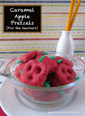 Caramel apple pretzels in a clear glass bowl with title