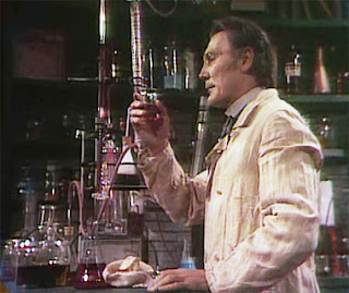 Jack Palance as Dr. Jekyll in an early lab scene