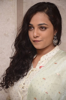 nitya menon at 100 days of love audio launch nitya menon at 100 days of love audio launch