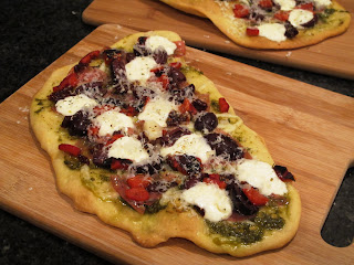 pizza on cutting board